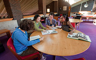 Students studying in Josten Performing Arts Library