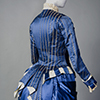 view of bustle of a silk blue day dress from 1880s