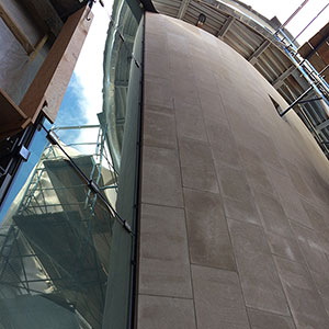 Intersection of the glass throat wall and the north addition limestone