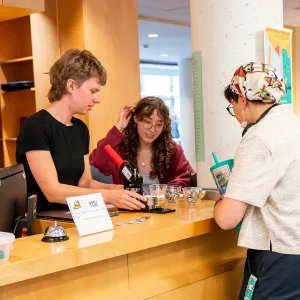 Hillyer Library service desk staff and students