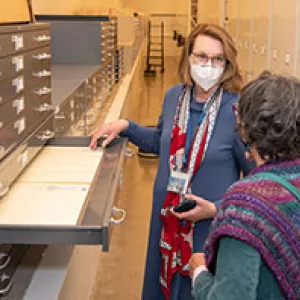 Friends observing collections in Special Collections