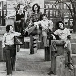 women standing together in the 1970s