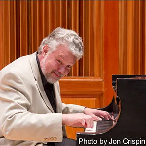 Jerry Noble playing the piano