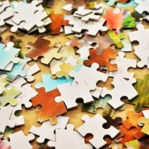 a pile of jigsaw puzzle pieces