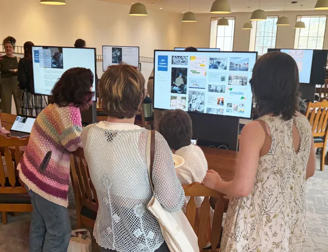 People viewing the castone exhibits 2025