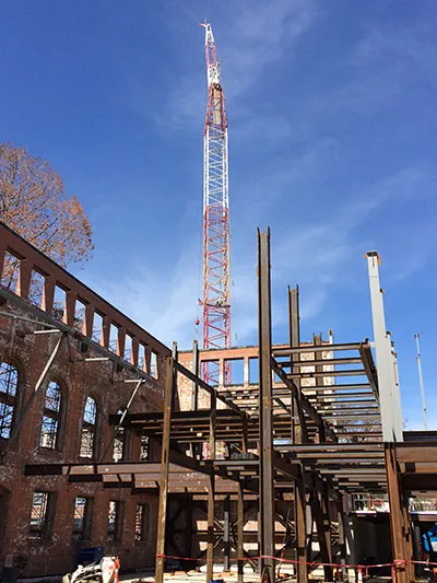 Crane and steel in New Neilson Library construction