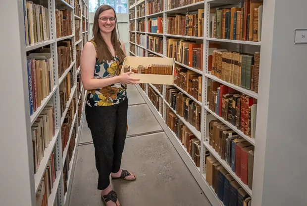 Staff in Special Collections stacks