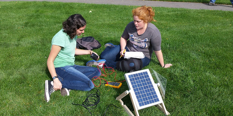 Students working on solar power experiment