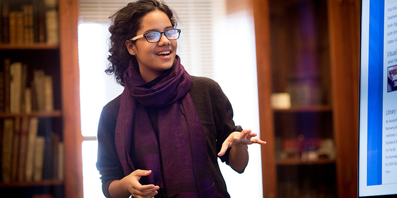 Student presenting in Special Collections